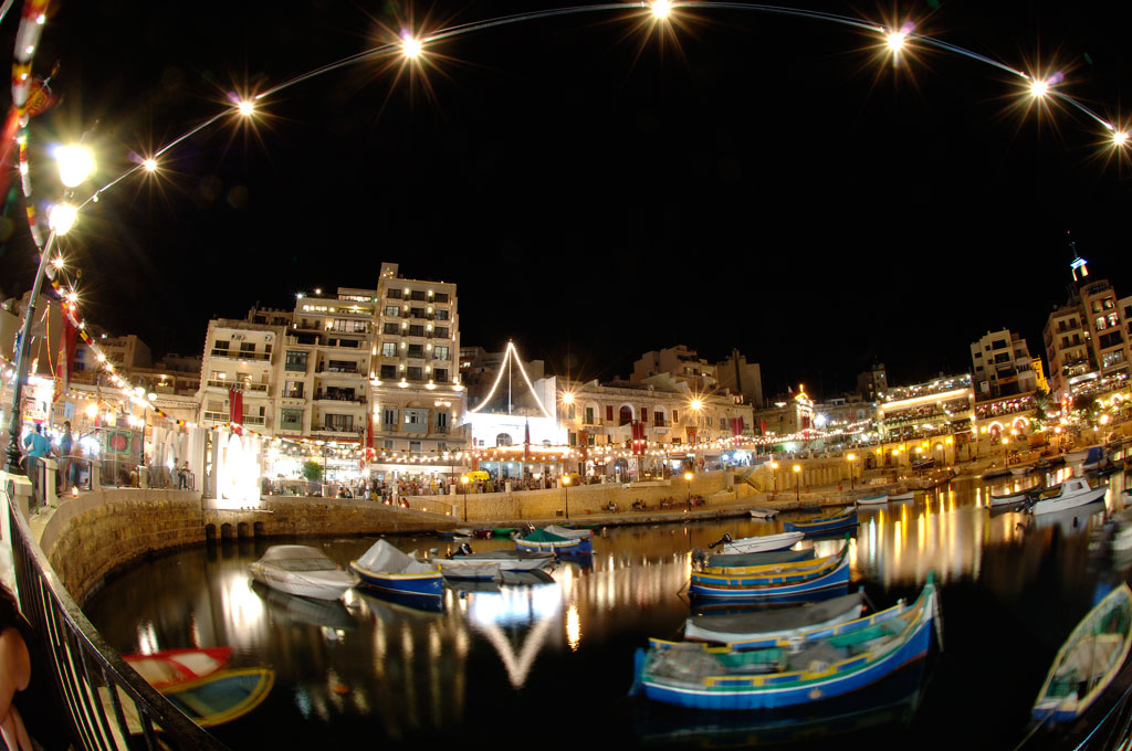 St. Julian's Bay during the village feast with some traditional Maltese fishing boats